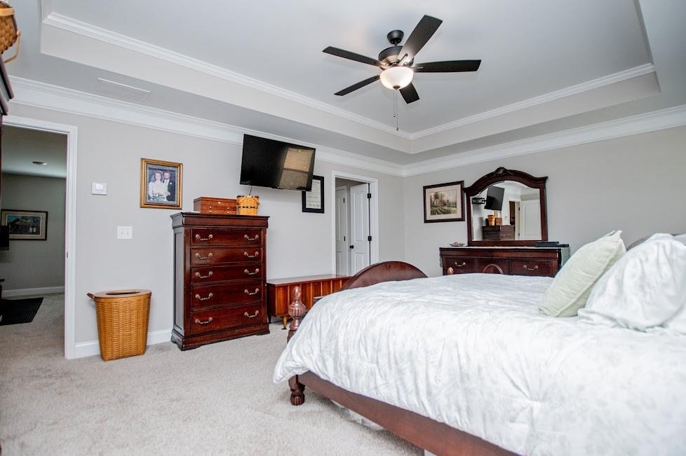 1851 McGarity Road Temple, GA 30179 - Photo 26 of 94 a bedroom with a bed and a flat screen tv