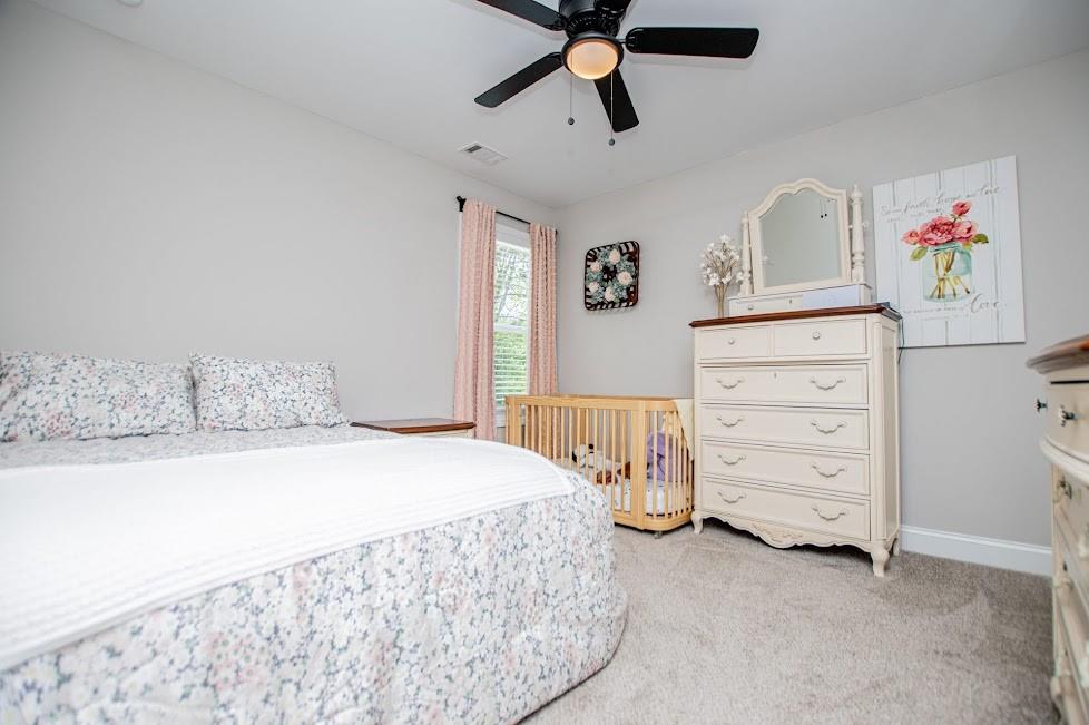 1851 McGarity Road Temple, GA 30179 - Photo 34 of 94 a bedroom with a bed and a dresser