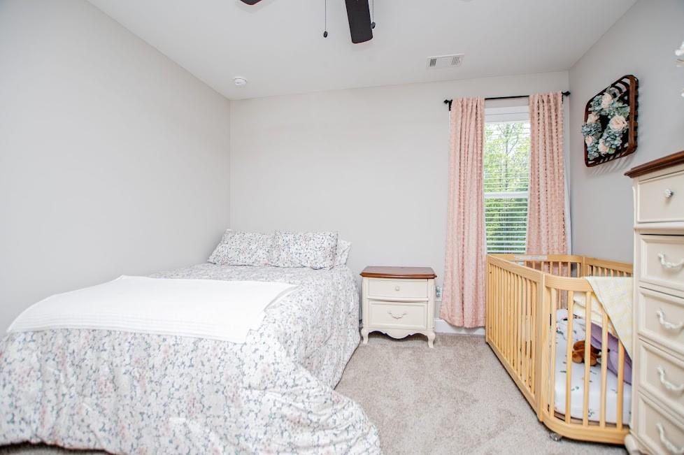 1851 McGarity Road Temple, GA 30179 - Photo 35 of 94 a bedroom with a bed a couch and a window