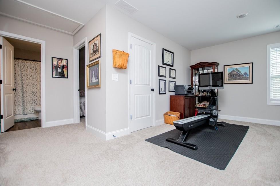 1851 McGarity Road Temple, GA 30179 - Photo 45 of 94 a view of a livingroom with workspace and a window