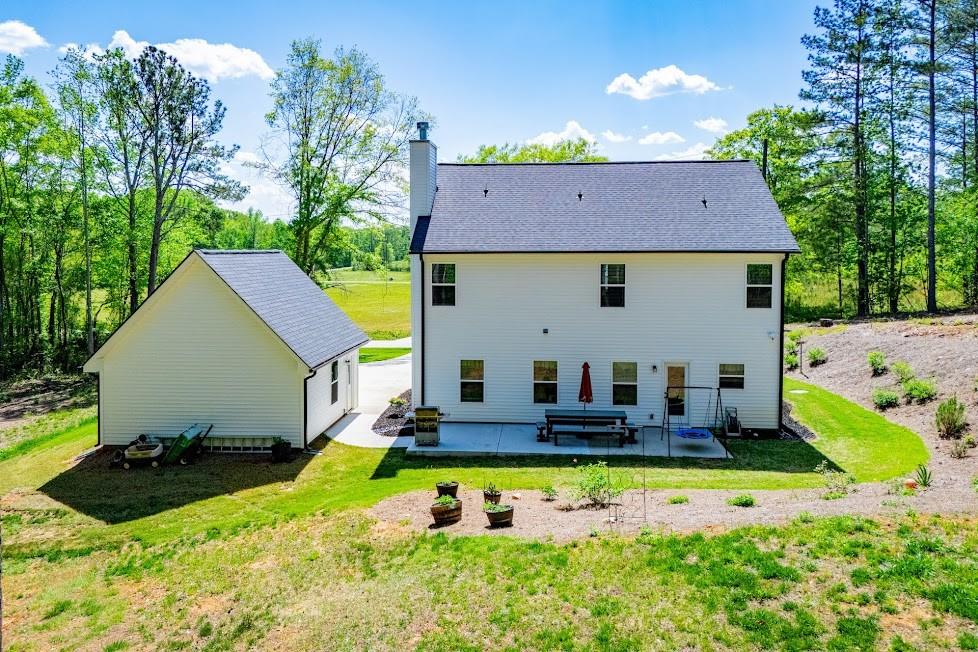 1851 McGarity Road Temple, GA 30179 - Photo 81 of 94 a aerial view of a house with swimming pool yard and outdoor seating