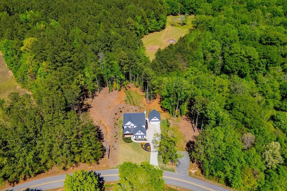 1851 McGarity Road Temple, GA 30179 - Photo 86 of 94 an aerial view of residential houses with outdoor space and trees all around