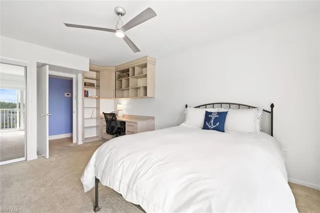 a bedroom with a bed and closet