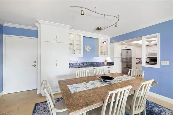 a view of a dining room with furniture