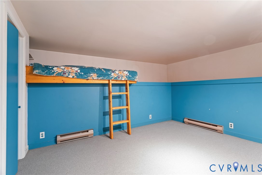 9440 Deerpark Court Midlothian, VA 23112 - Photo 32 of 55 an empty room with walk in closet