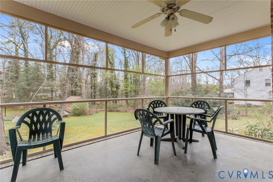9440 Deerpark Court Midlothian, VA 23112 - Photo 34 of 55 a view of a dining room with furniture window and outside view
