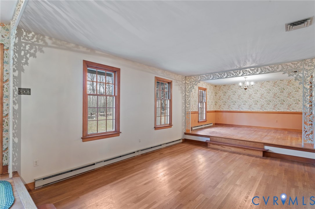 9440 Deerpark Court Midlothian, VA 23112 - Photo 4 of 55 a view of room with window and hardwood floor