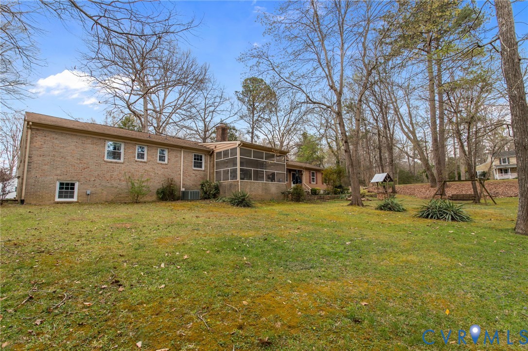 9440 Deerpark Court Midlothian, VA 23112 - Photo 41 of 55 a front view of house with yard and trees