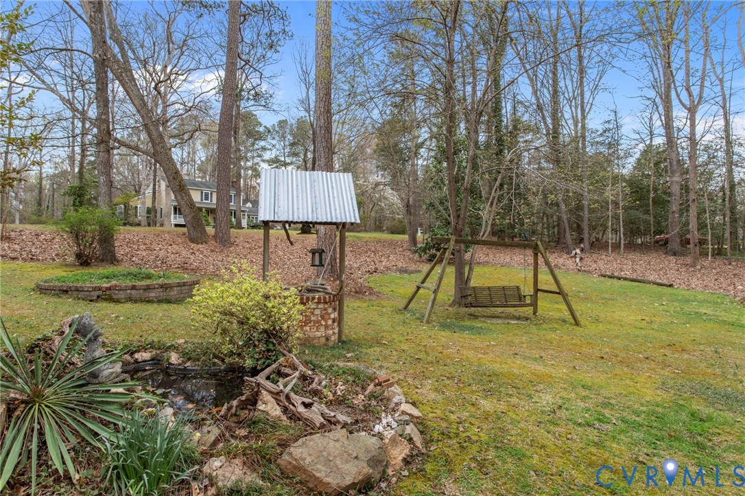 9440 Deerpark Court Midlothian, VA 23112 - Photo 47 of 55 a view of a park with a slide