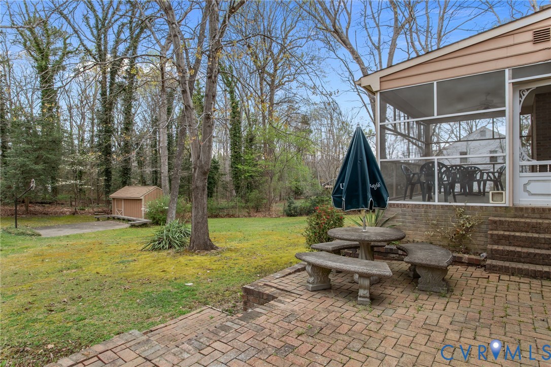 9440 Deerpark Court Midlothian, VA 23112 - Photo 48 of 55 a front view of a house with garden