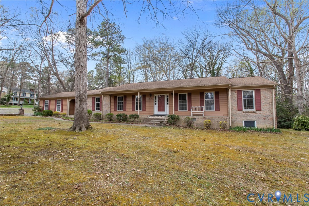 9440 Deerpark Court Midlothian, VA 23112 - Photo 54 of 55 a front view of a house with yard