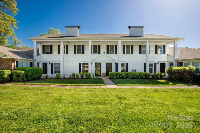 a front view of a house with swimming pool