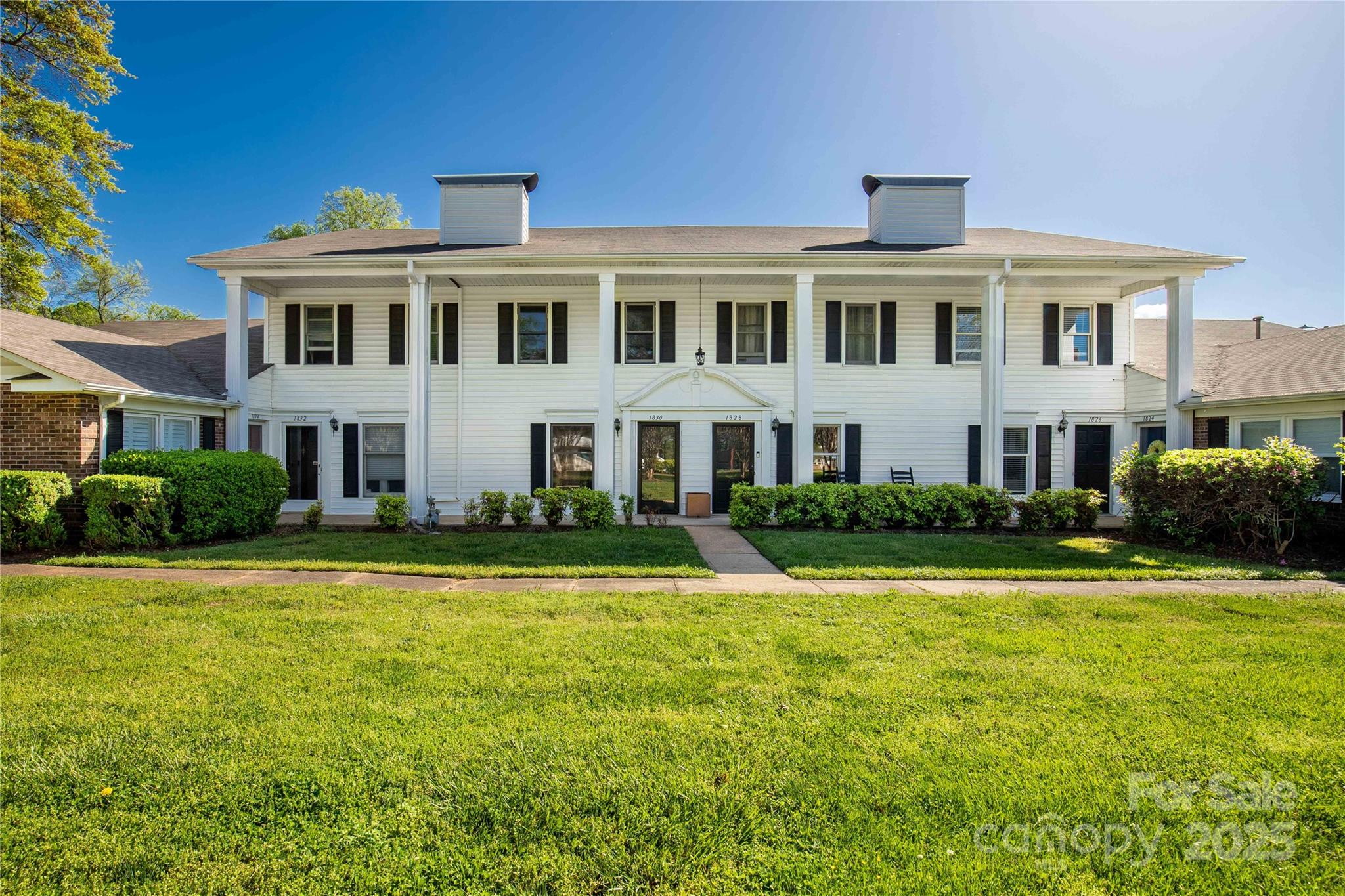 a front view of a house with swimming pool