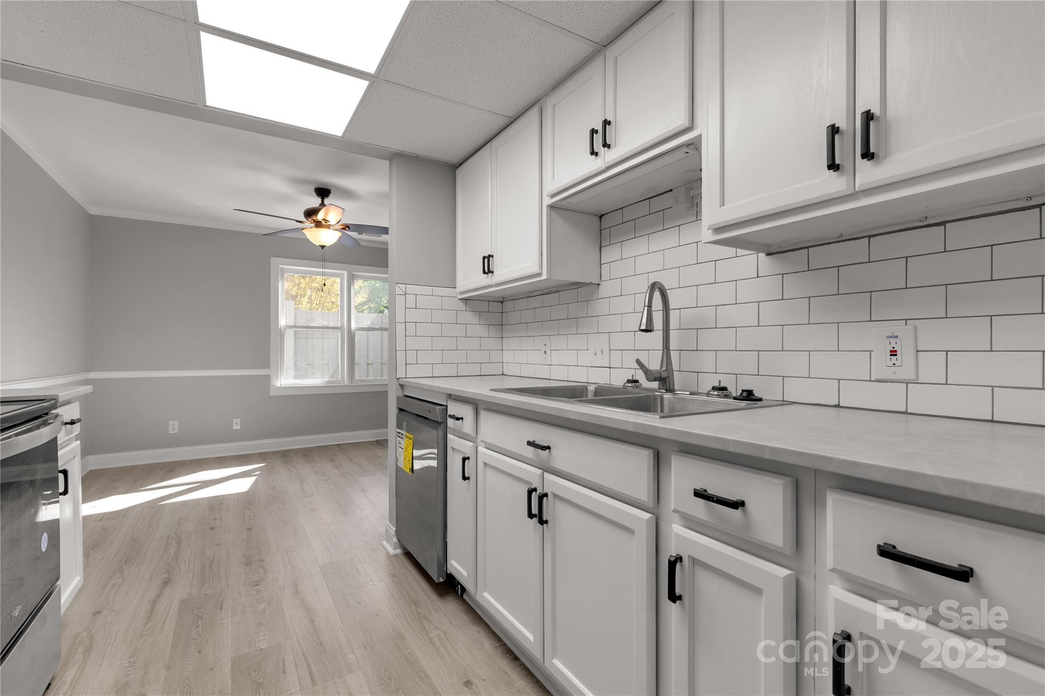 1830 Ebenezer Road Rock Hill, SC 29732 - Photo 11 of 23 a kitchen with a sink cabinets and window