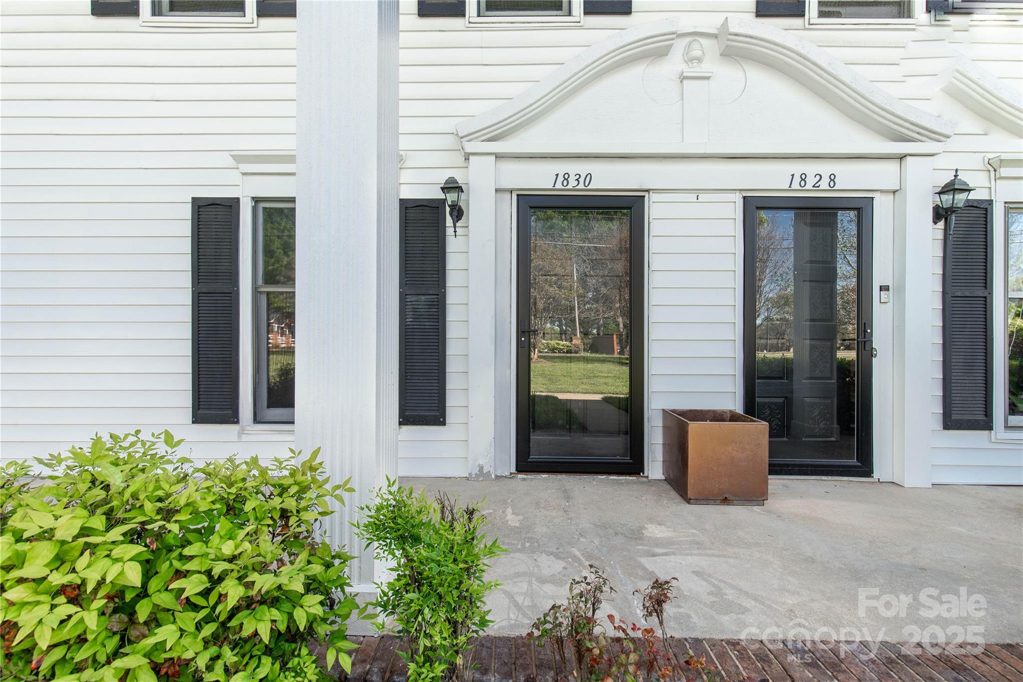 1830 Ebenezer Road Rock Hill, SC 29732 - Photo 4 of 23 a view of brick house with potted plants