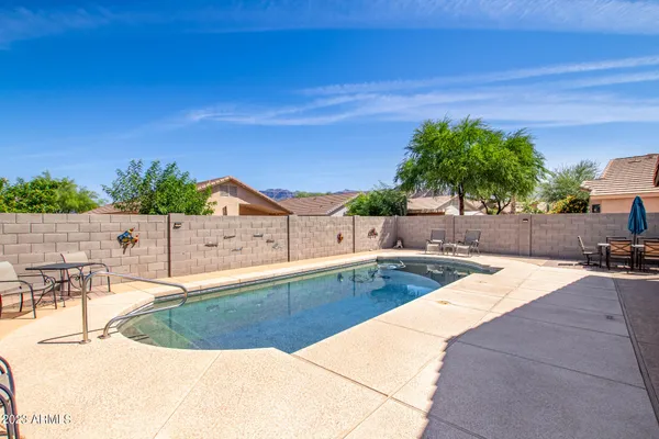 a backyard of a house with seating space