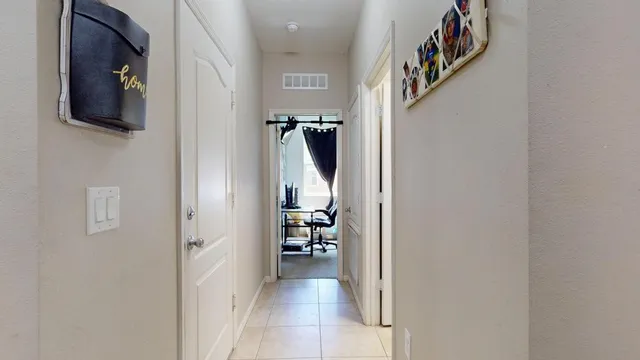 a view of a hallway and stairs