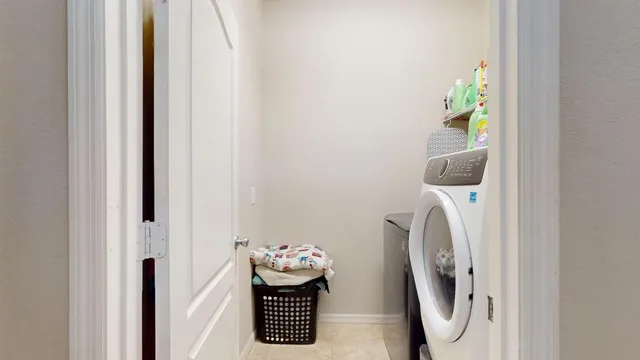 a dining room with furniture window and outside view