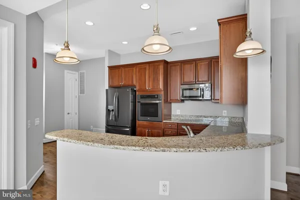 a kitchen with a sink and a window