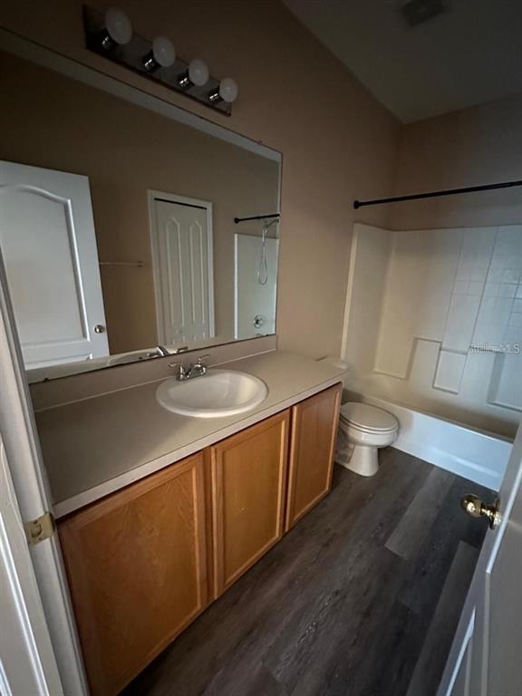 5882 Fishhawk Ridge Drive Lithia, FL 33547 - Photo 14 of 34 a bathroom with a sink and a mirror