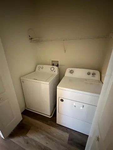 a utility room with dryer and washer