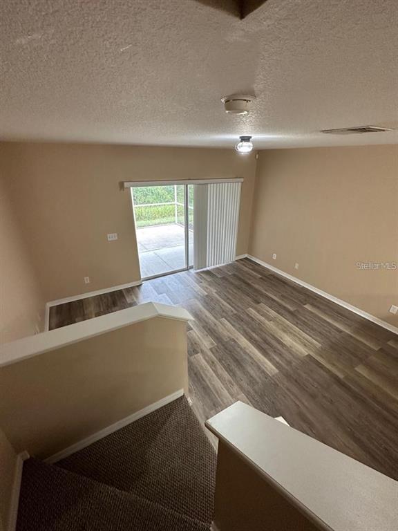 5882 Fishhawk Ridge Drive Lithia, FL 33547 - Photo 27 of 34 a view of room with window and a ceiling fan