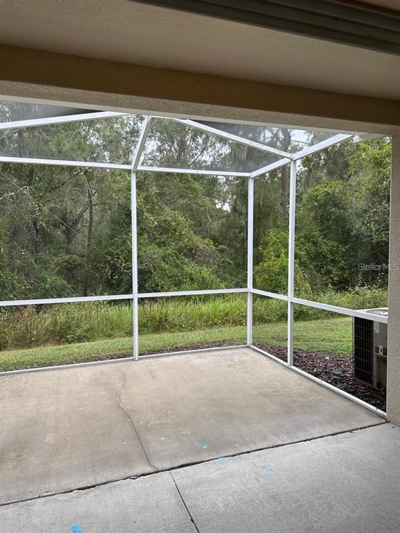5882 Fishhawk Ridge Drive Lithia, FL 33547 - Photo 31 of 34 a view of outdoor space with porch