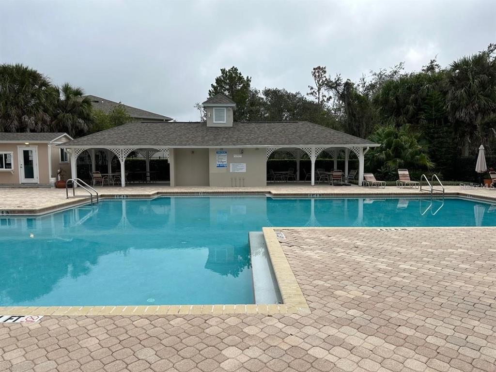 5882 Fishhawk Ridge Drive Lithia, FL 33547 - Photo 32 of 34 a view of a house with a yard
