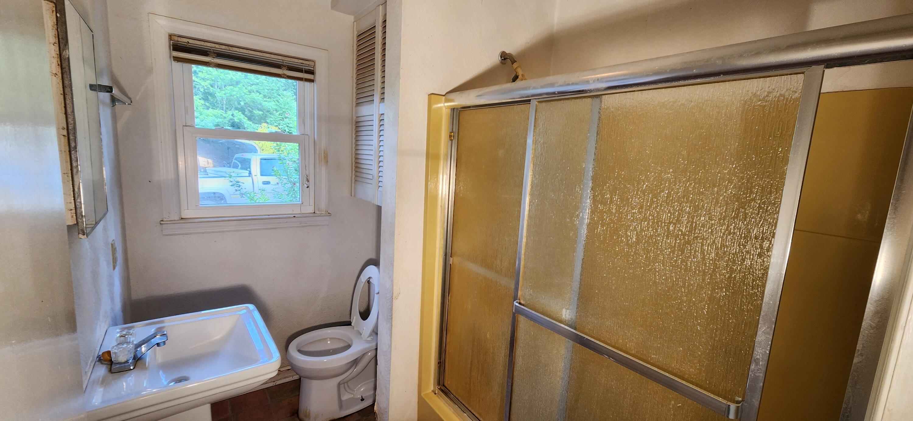 2805 Ruritan Road Rocky Mount, VA 24151 - Photo 14 of 24 a bathroom with a shower and a toilet