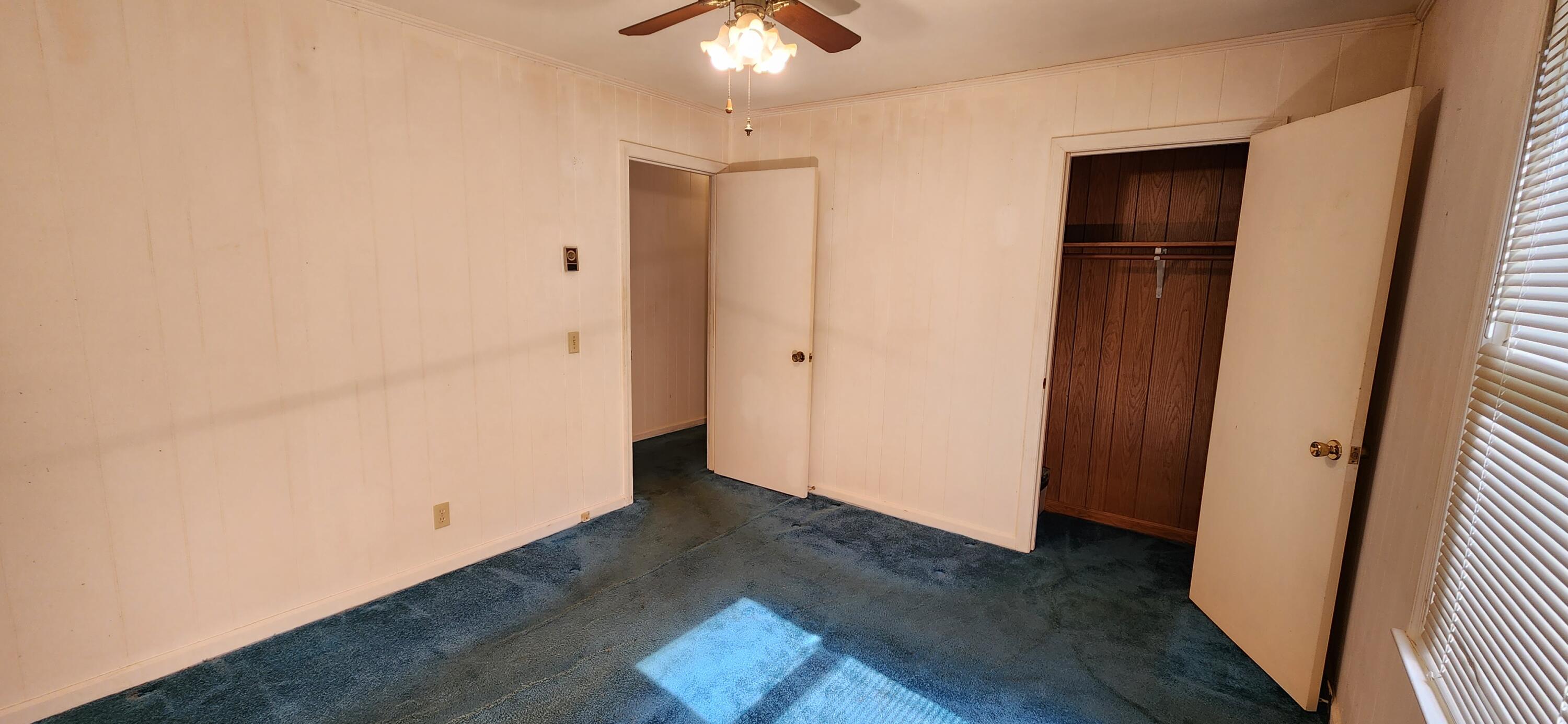 2805 Ruritan Road Rocky Mount, VA 24151 - Photo 15 of 24 an empty room with wooden floor and carpet