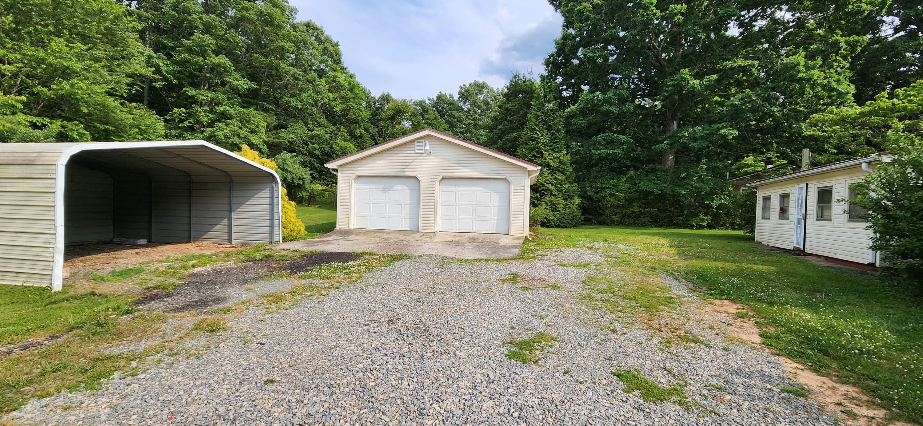 2805 Ruritan Road Rocky Mount, VA 24151 - Photo 19 of 24 a front view of a house with garden