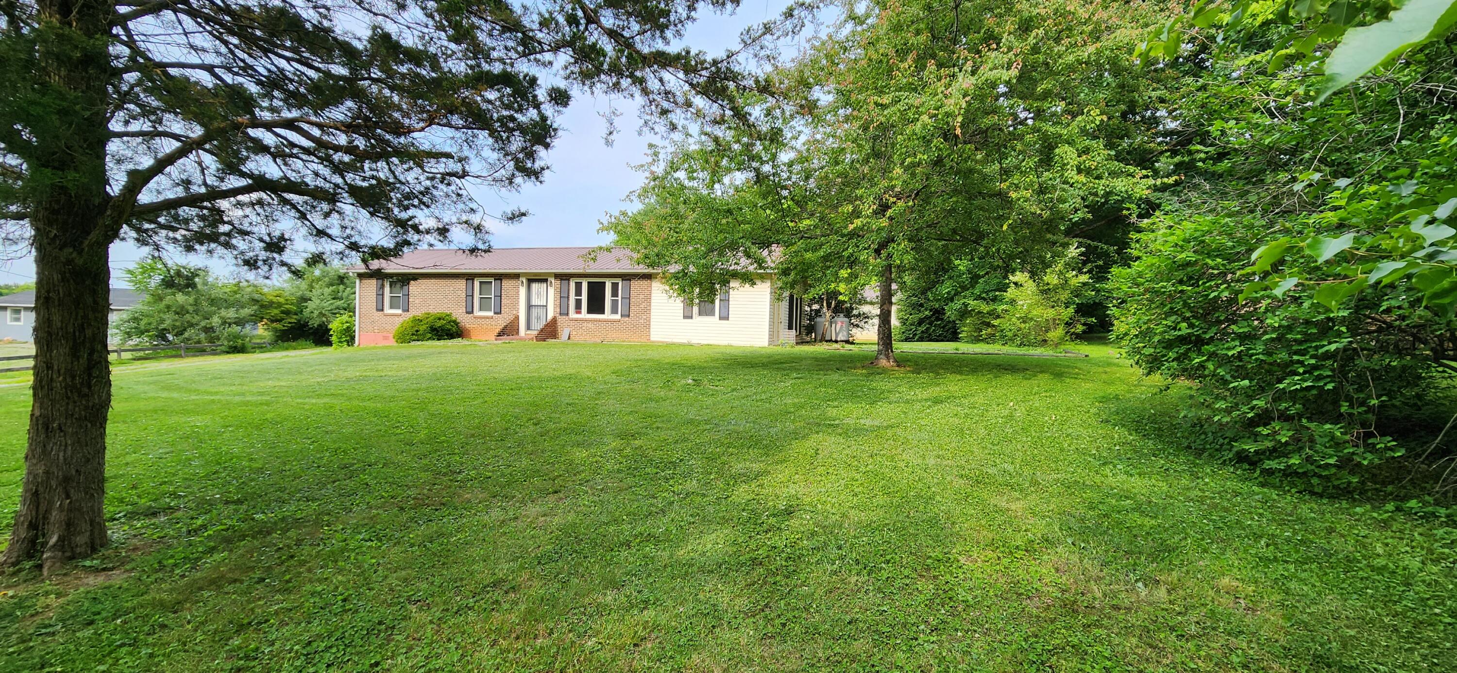2805 Ruritan Road Rocky Mount, VA 24151 - Photo 23 of 24 a view of house in front of a big yard with large trees