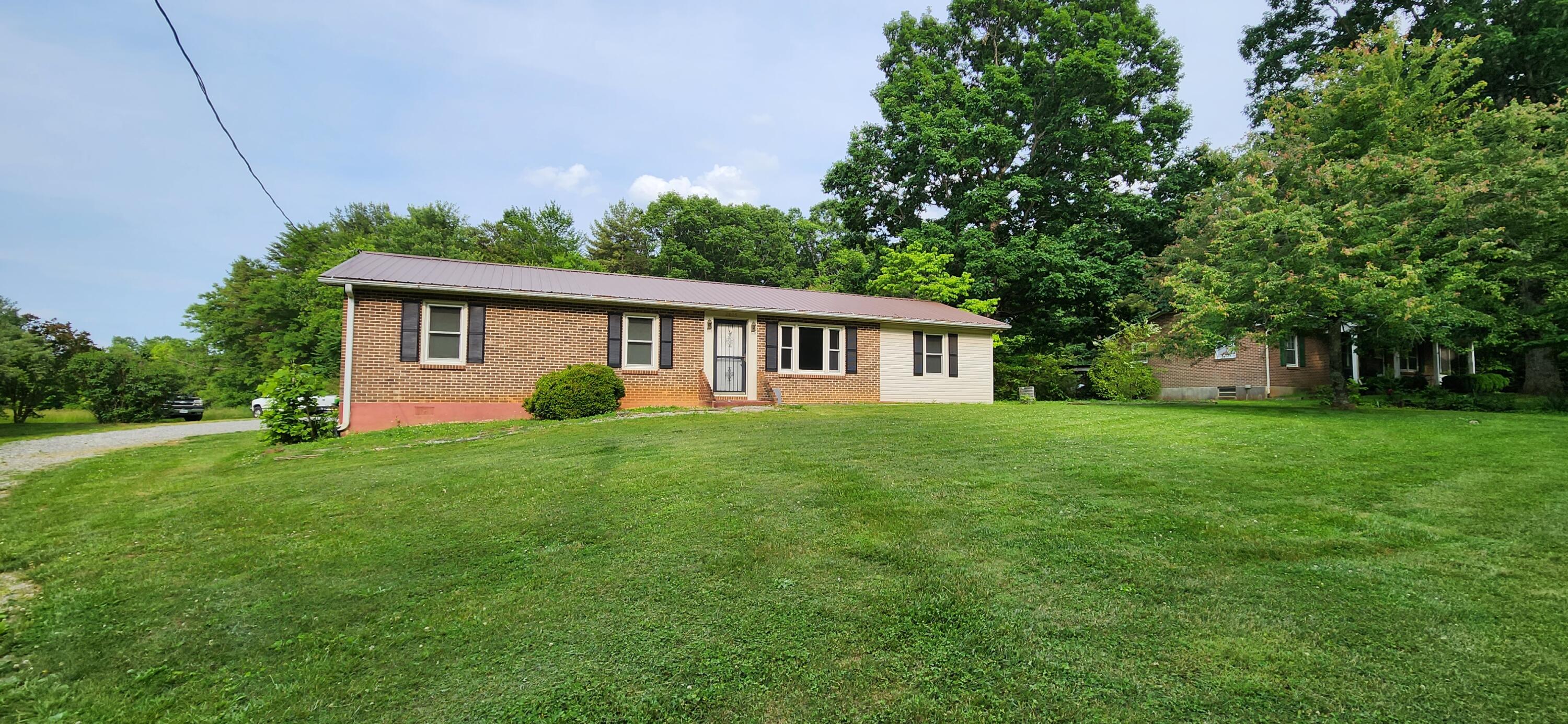 2805 Ruritan Road Rocky Mount, VA 24151 - Photo 24 of 24 a view of a house with backyard and garden