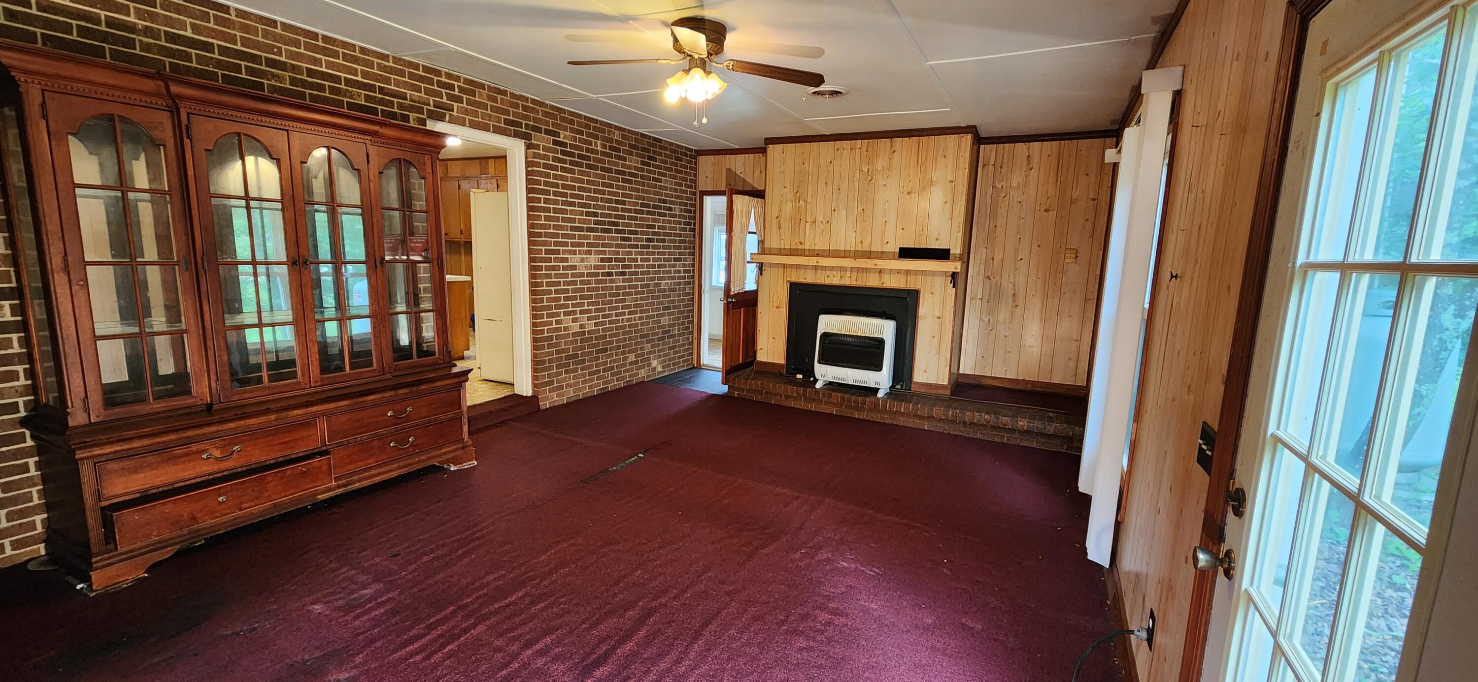 2805 Ruritan Road Rocky Mount, VA 24151 - Photo 7 of 24 a view of hall way with furniture and fireplace