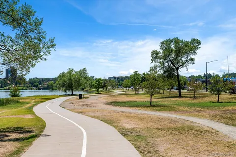 a view of a swimming pool with a yard