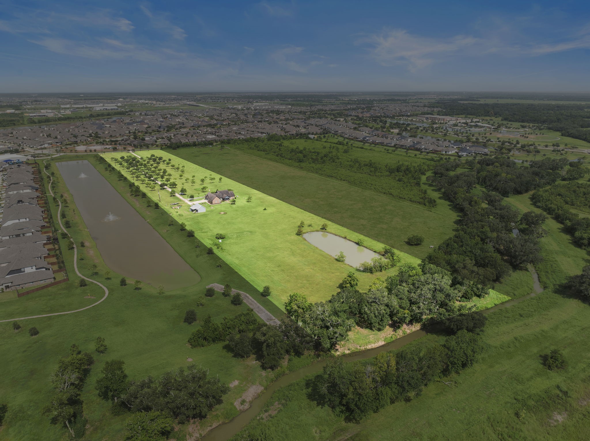 This property is bordered by mature trees and backs up to a quiet bayou, creating a private and tranquil natural buffer.