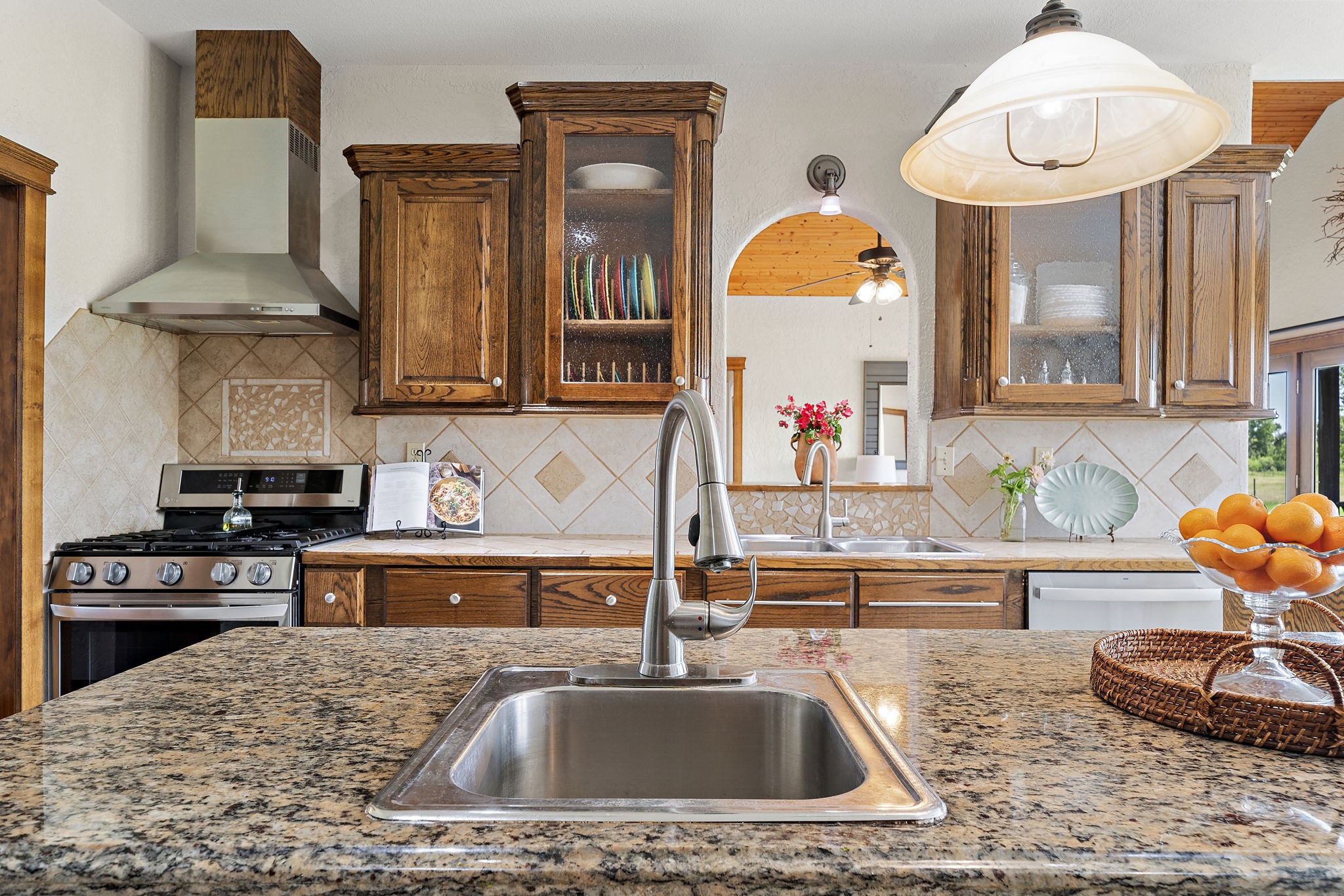 10411 County Road 65 Rosharon, TX 77583 - Photo 14 of 29 The kitchen is anchored by a large granite island that not only offers generous prep space, but also naturally draws people together.