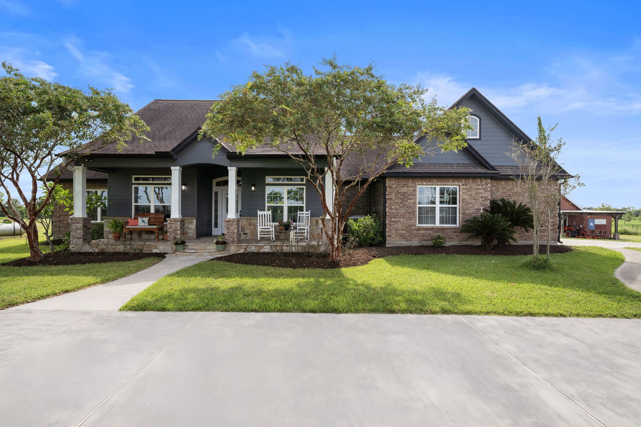 10411 County Road 65 Rosharon, TX 77583 - Photo 2 of 29 The home features a freshly painted exterior and new windows, creating a bright and inviting first impression.