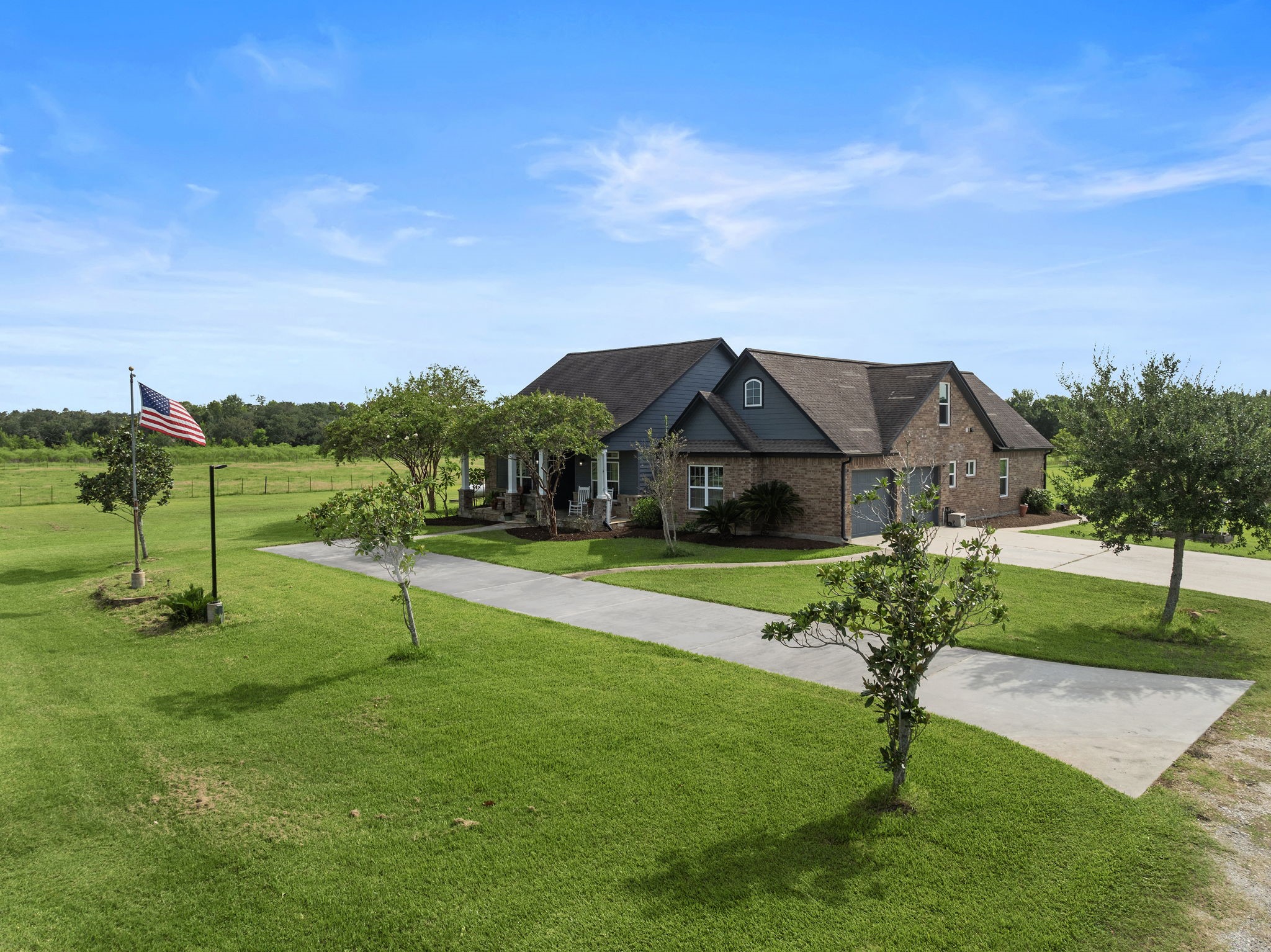 10411 County Road 65 Rosharon, TX 77583 - Photo 28 of 29 The home’s second driveway provides generous parking and makes hosting guests or accommodating multiple vehicles effortless.