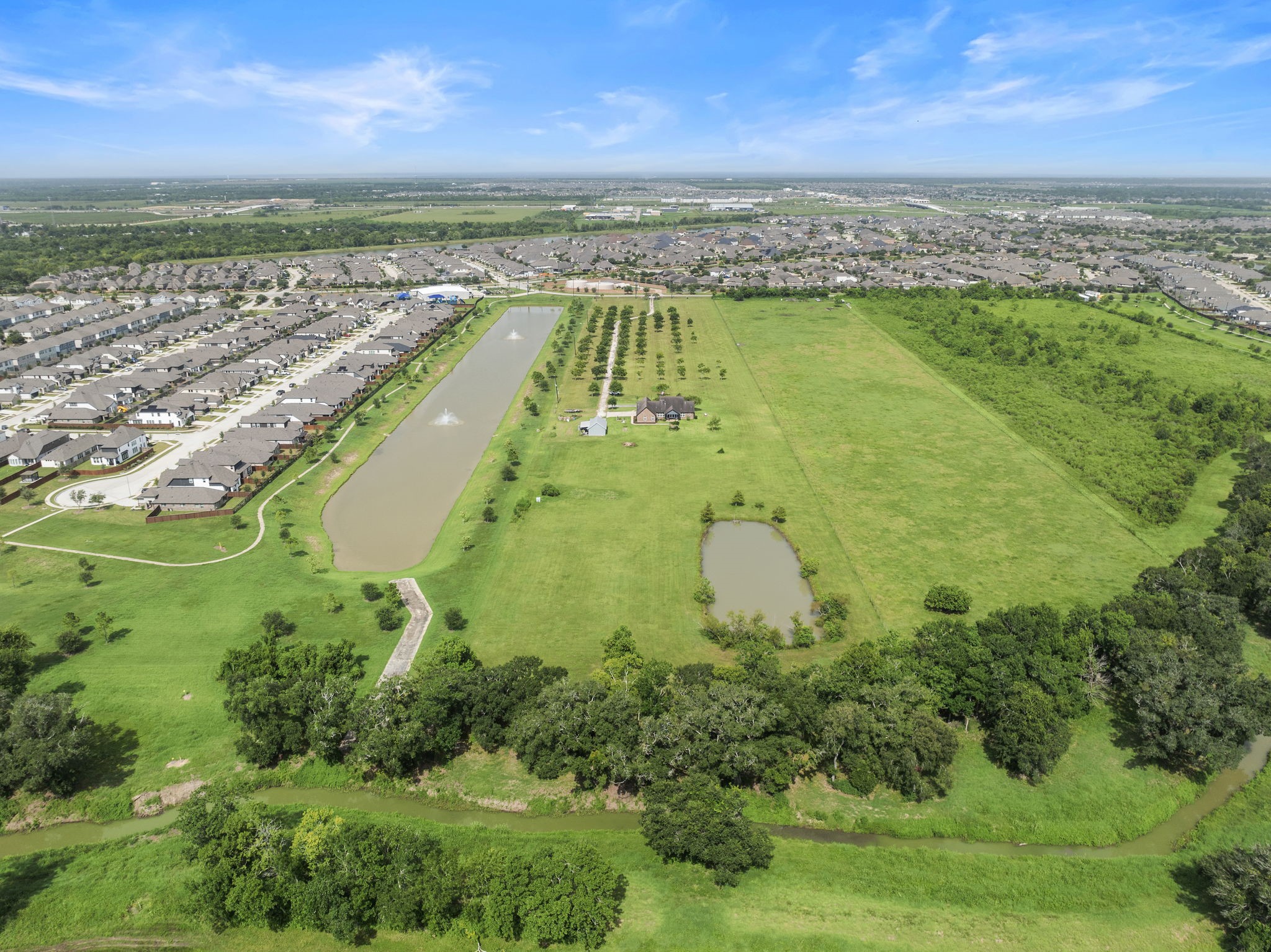 10411 County Road 65 Rosharon, TX 77583 - Photo 7 of 29 This legacy property offers a rare sense of privacy and space while still providing convenient access to nearby suburban amenities.