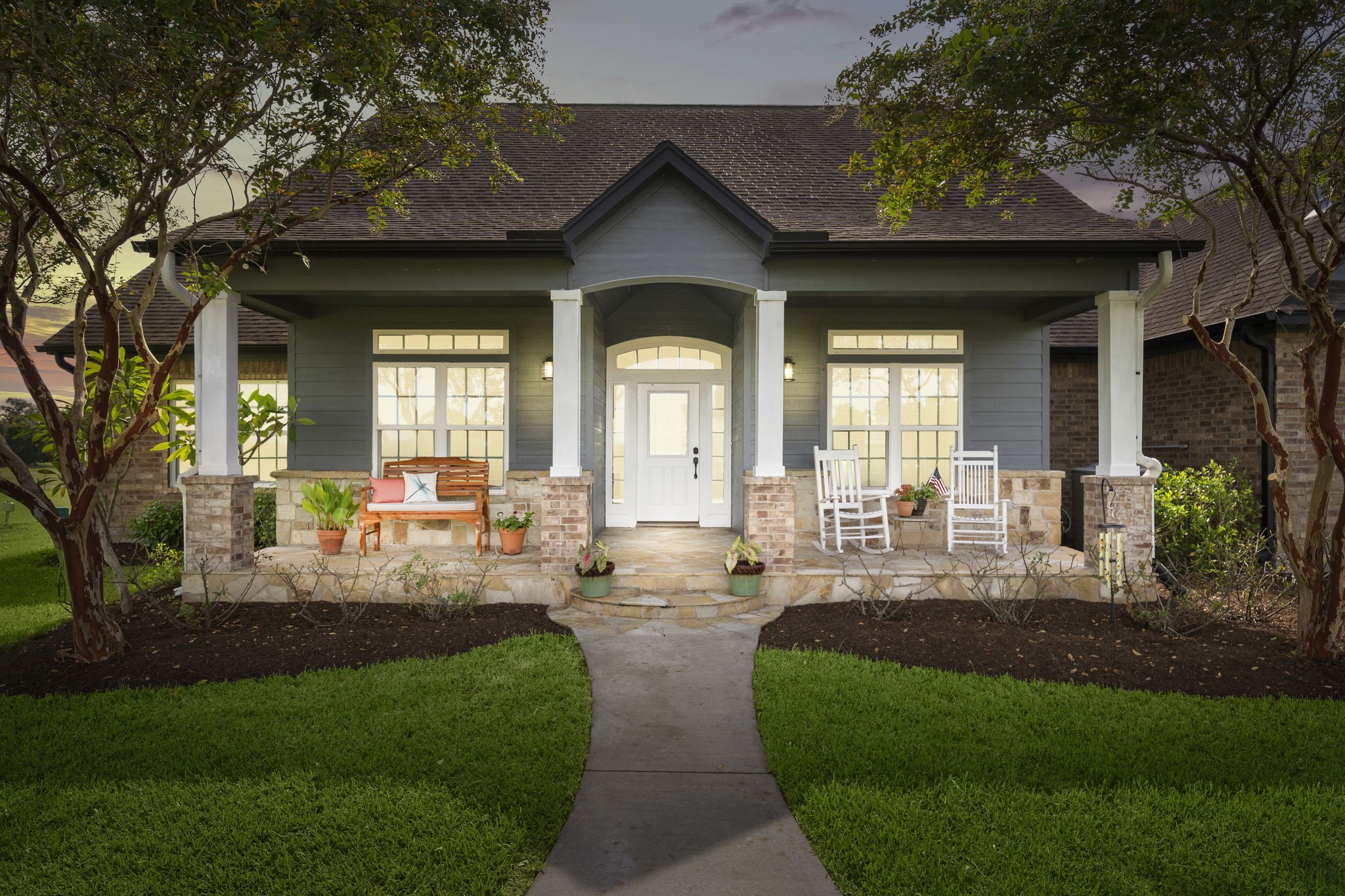 10411 County Road 65 Rosharon, TX 77583 - Photo 8 of 29 The welcoming front porch is perfect for enjoying quiet country mornings and spending time with family and friends.