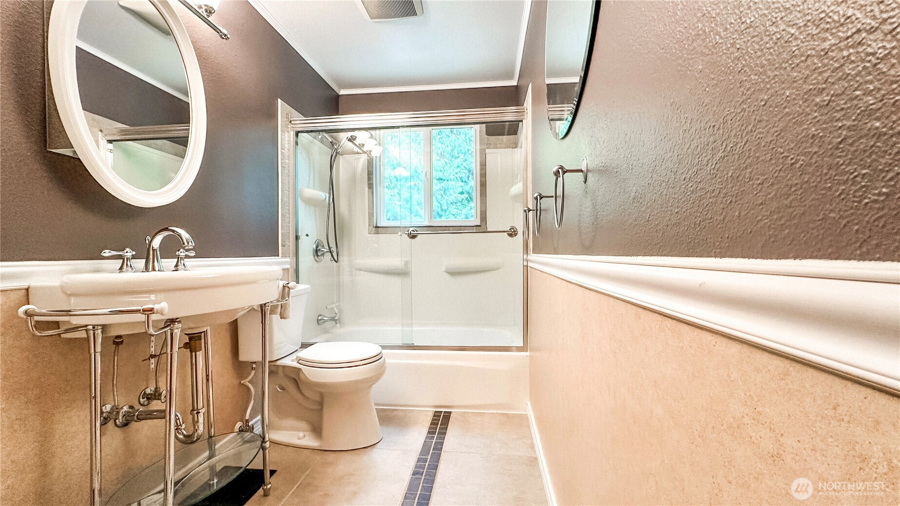 2830 216th Avenue Southeast Sammamish, WA 98075 - Photo 14 of 23 a bathroom with a sink toilet and a mirror