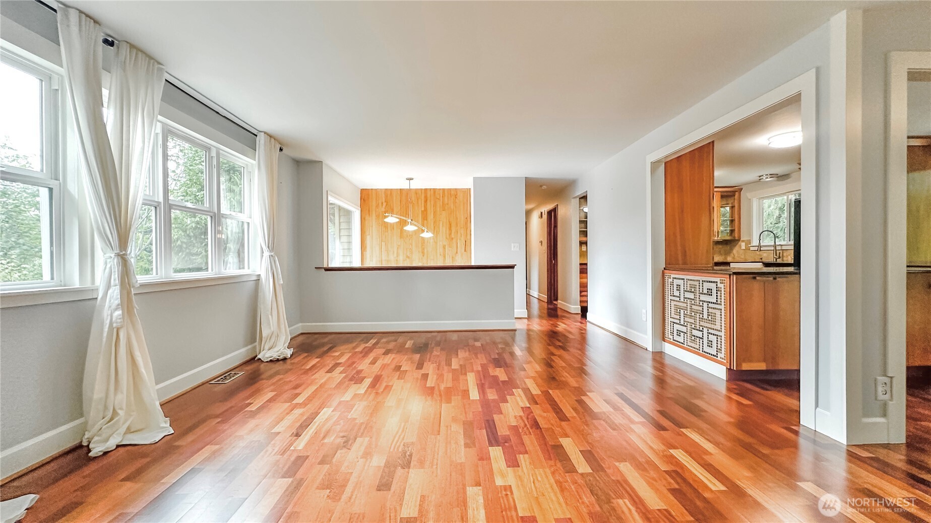 2830 216th Avenue Southeast Sammamish, WA 98075 - Photo 5 of 23 wooden floor in an empty room with a window
