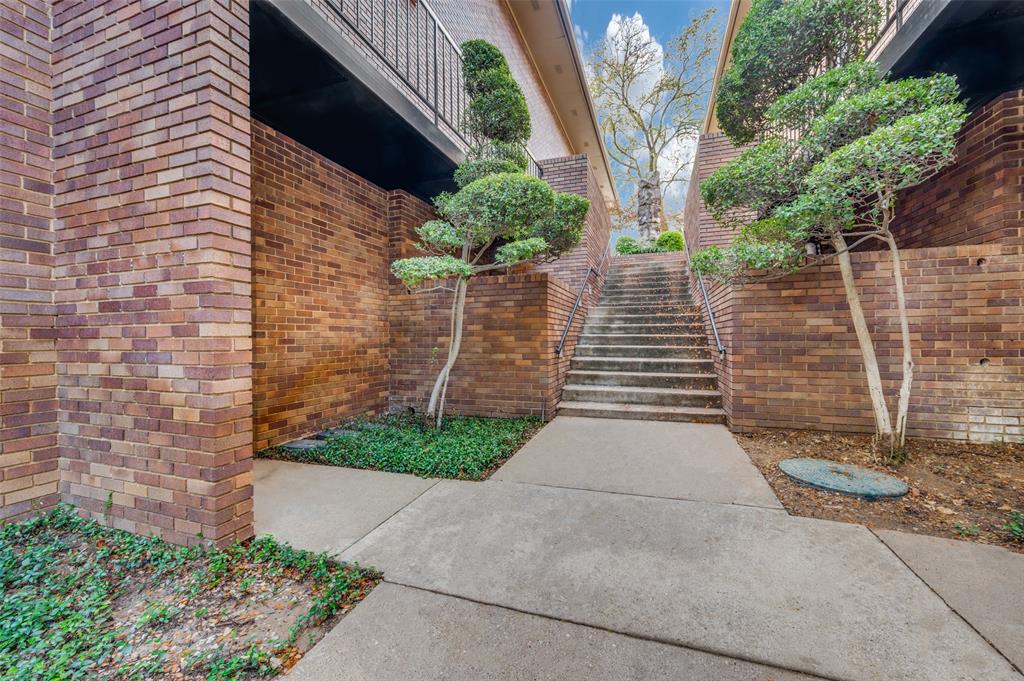 a backyard of a house with plants
