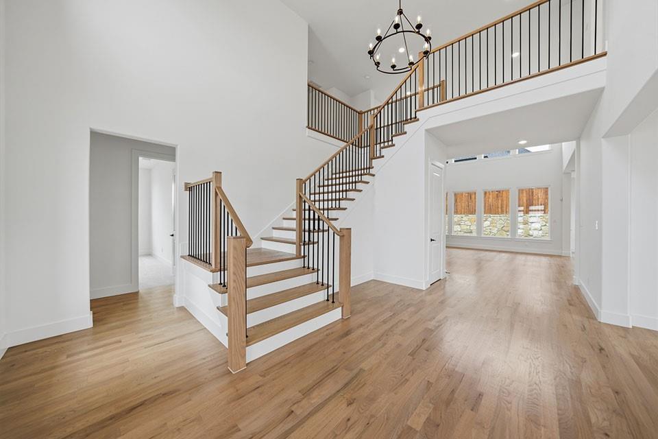 205 Ardsley Way Allen, TX 75013 - Photo 16 of 37 a view of entryway with wooden floor and stairs