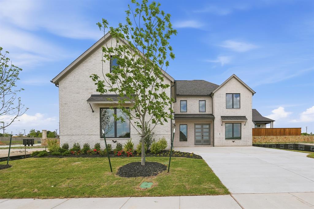 205 Ardsley Way Allen, TX 75013 - Photo 2 of 37 a front view of a house with a yard