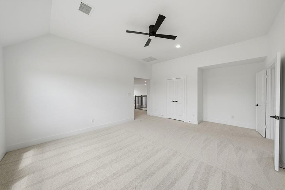 205 Ardsley Way Allen, TX 75013 - Photo 26 of 37 a view of an empty room with a ceiling fan