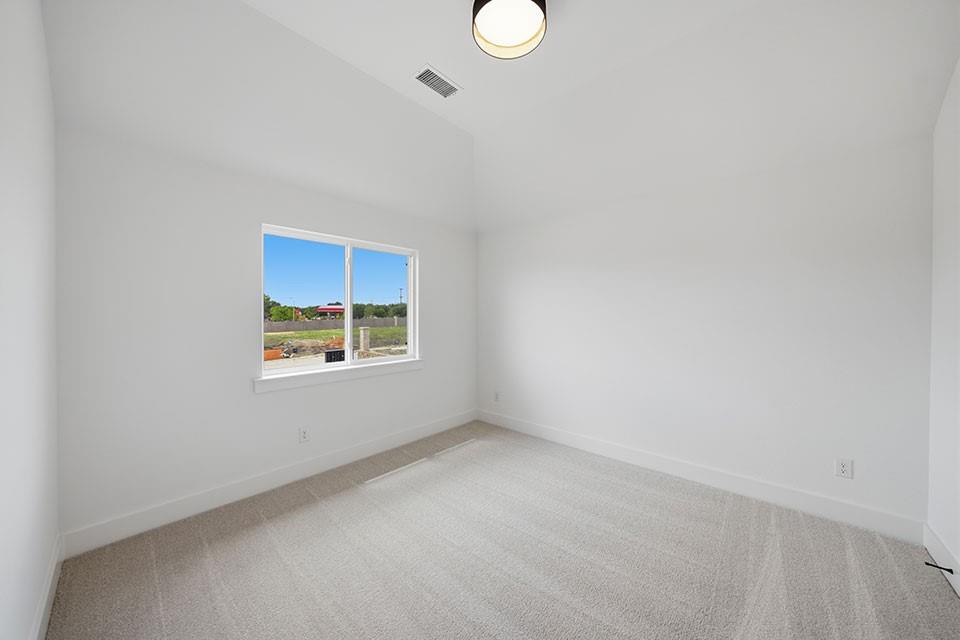 205 Ardsley Way Allen, TX 75013 - Photo 28 of 37 a view of an empty room with a window