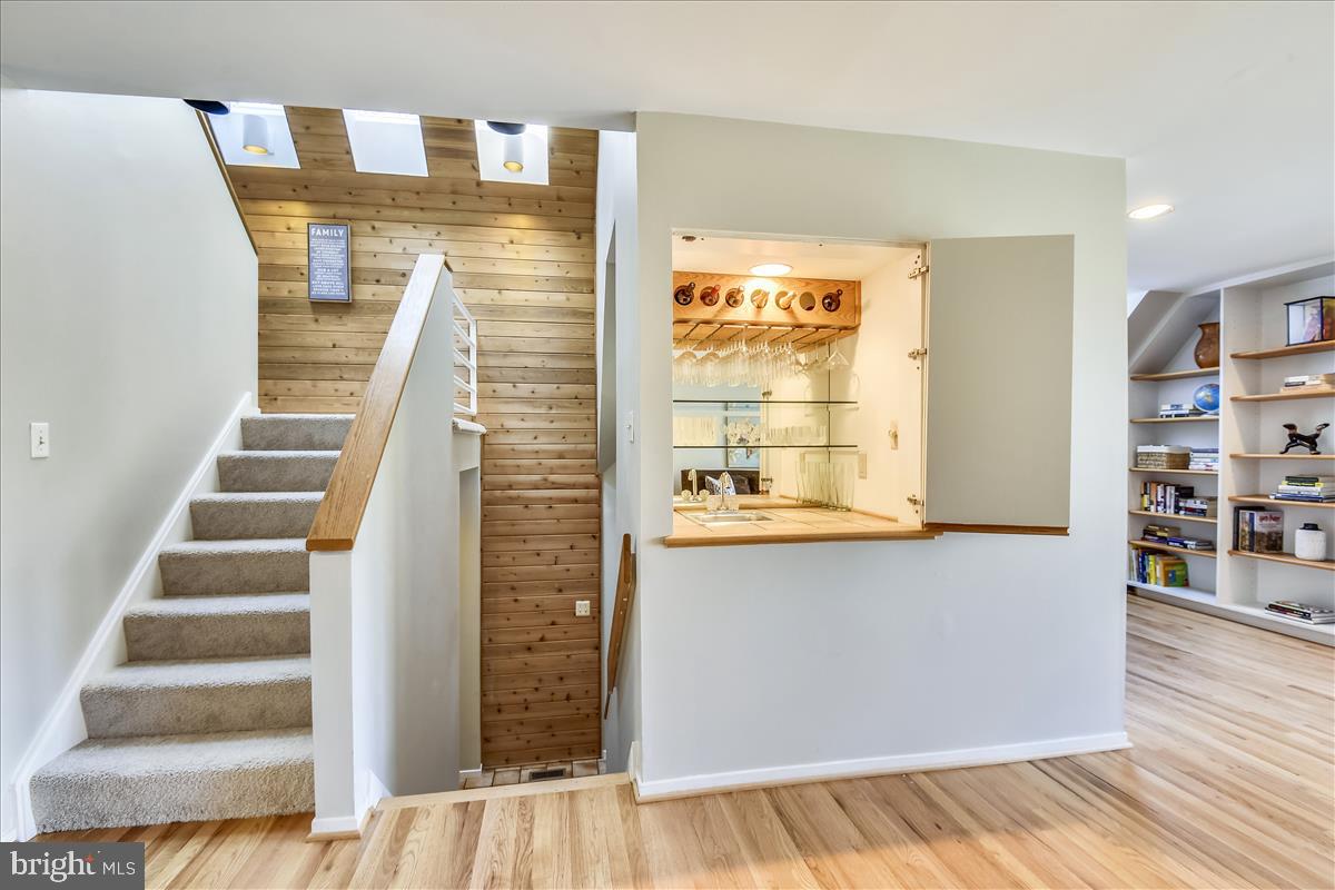 2021 Turtle Pond Drive Reston, VA 20191 - Photo 12 of 57 Lighted built-in wet bar with wine and glass rack