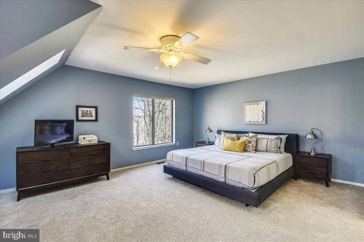 2021 Turtle Pond Drive Reston, VA 20191 - Photo 20 of 57 Luxurious master bedroom with skylight and fan